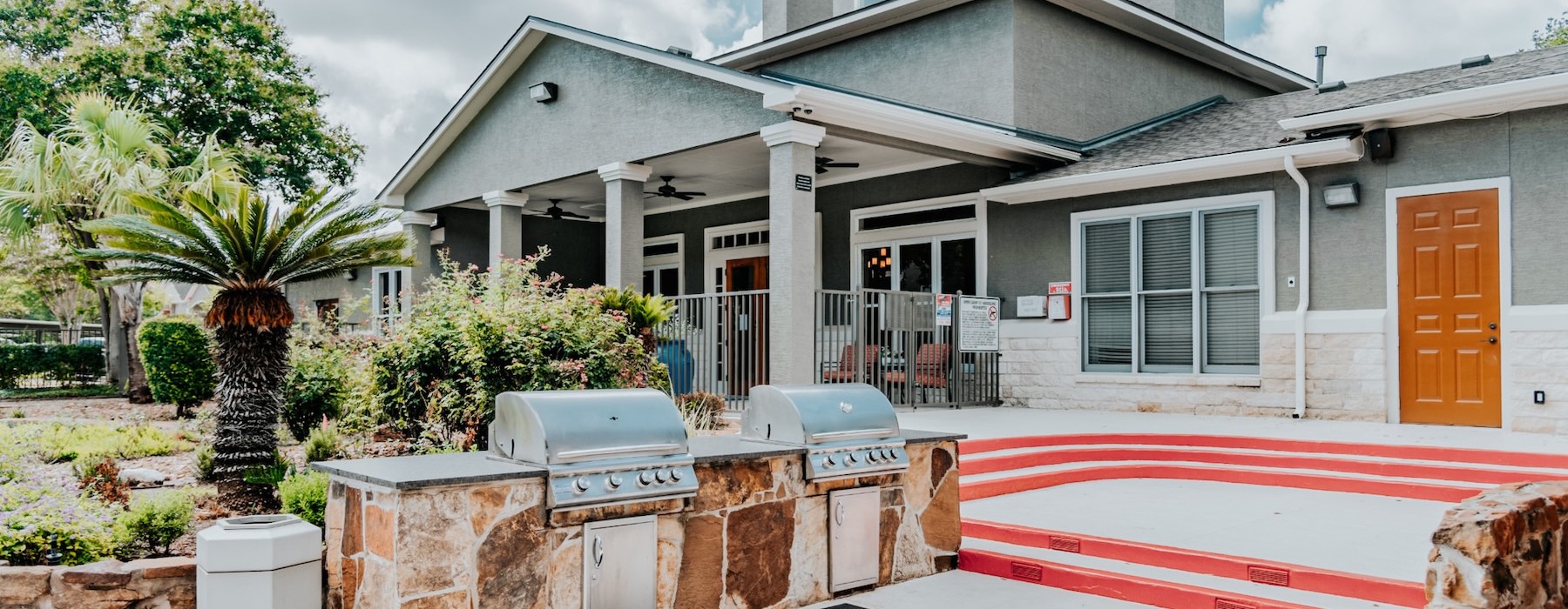 a grill area behind a building